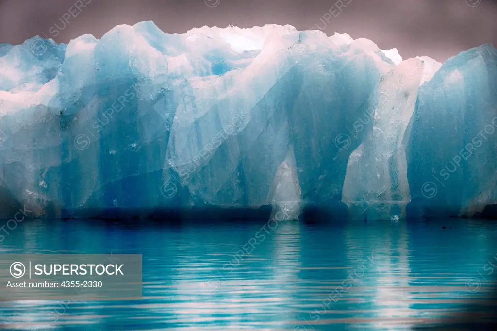 Norway, Greenland Sea, Monaco Glacier, Blue iceberg, defocused