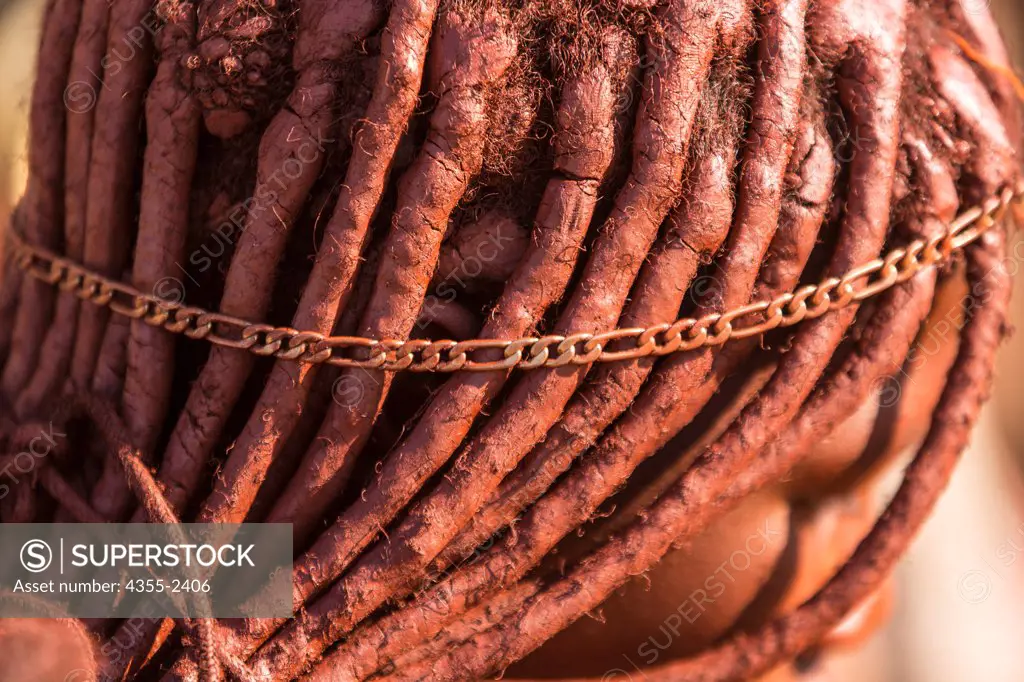 Namibia, Serra Cafema, Close-up of Himba tribe woman clay covered dreadlocks, side view