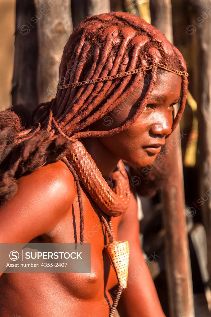 Namibia, Serra Cafema, Close-up of Himba tribe woman contemplating