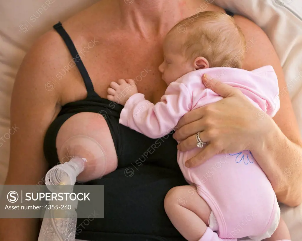 Woman with Baby and Breast Pump