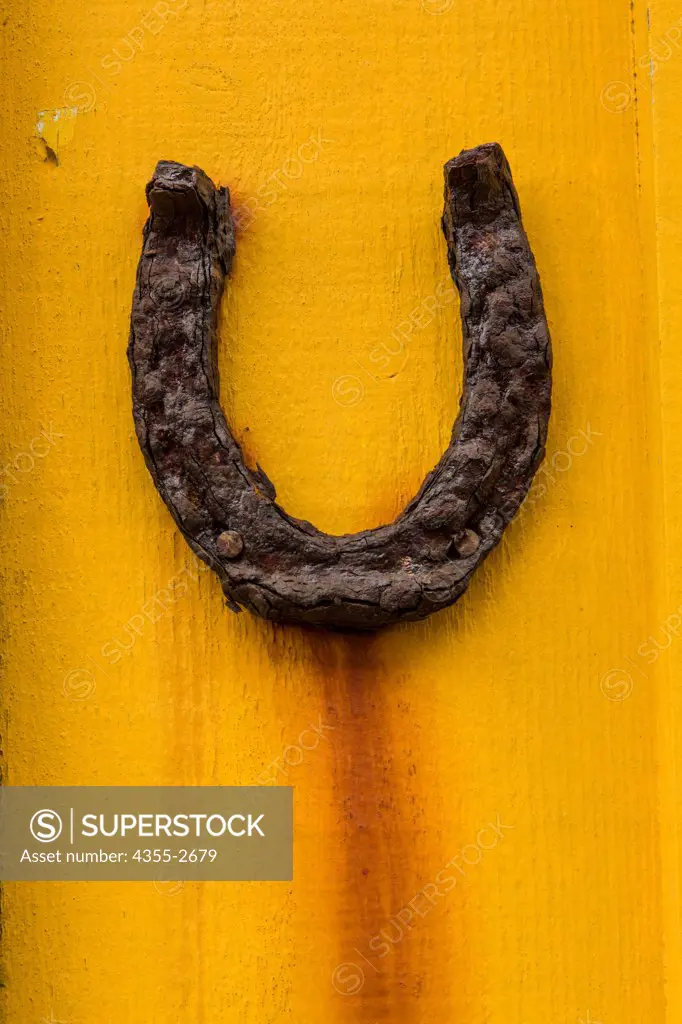 USA, California, Mendocino, Old horseshoe hanging on barn wall