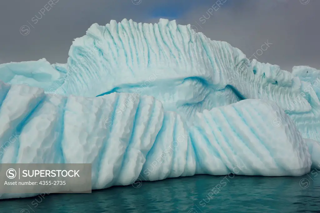 Tabular iceberg floating on water, Danko Island, Antarctica