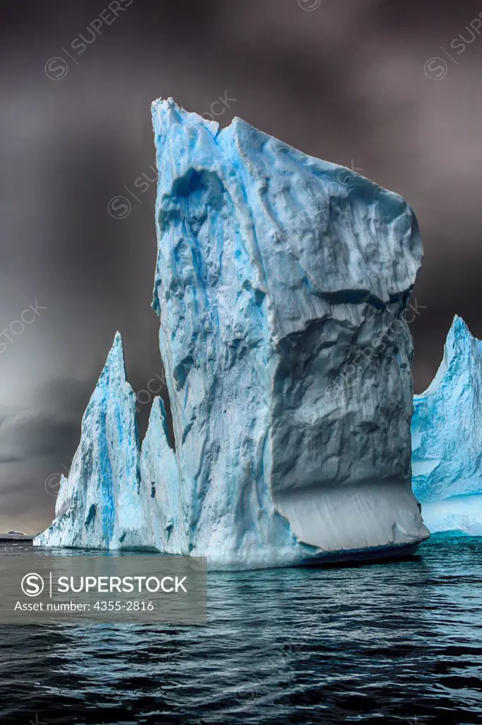 Goliath icebergs floating on water, Torgersen Island, Palmer Archipelago, Antarctica