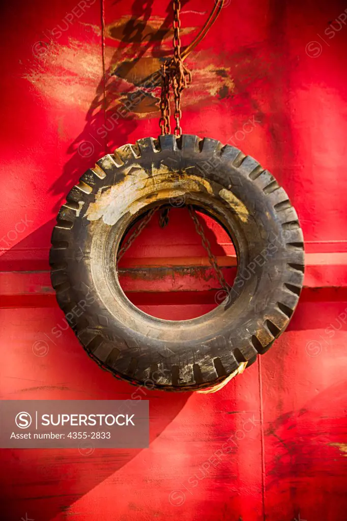 Tire hanging from a wall, Ushuaia, Tierra Del Fuego, Argentina