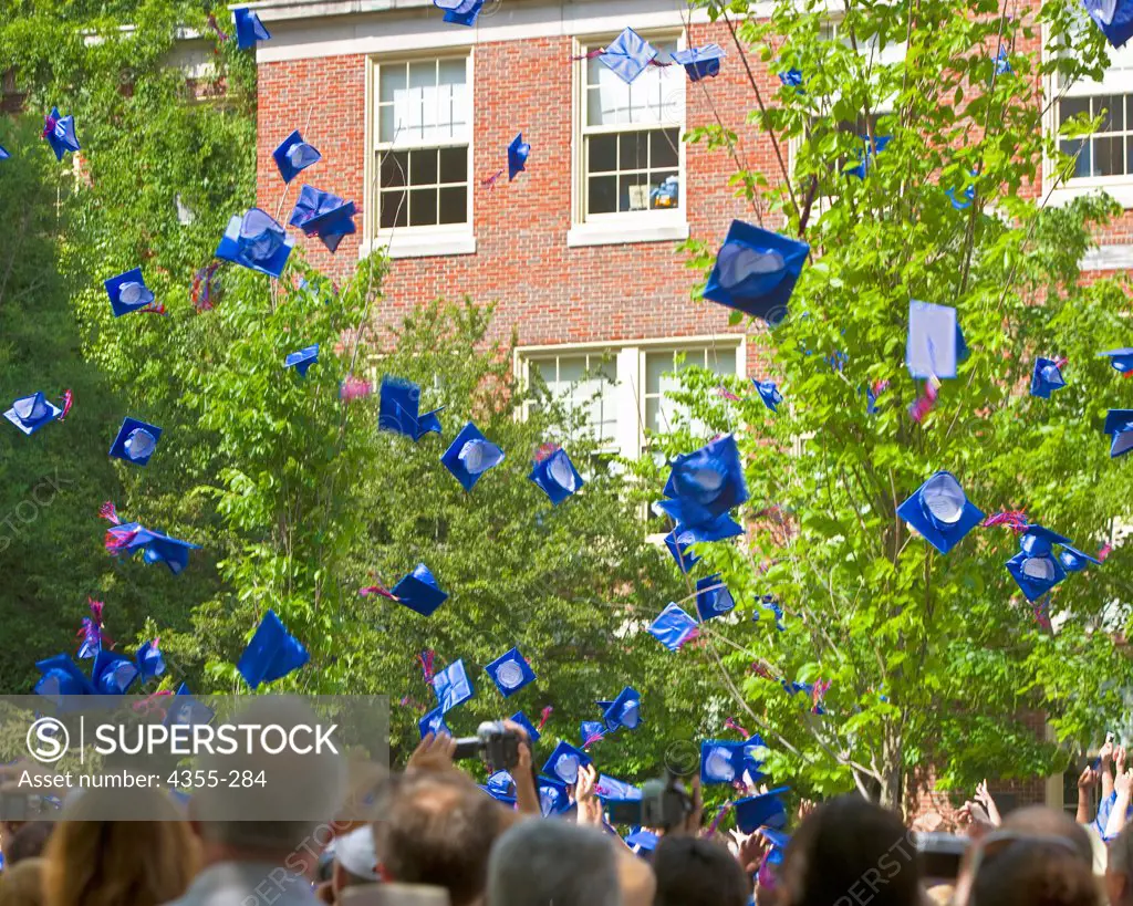 Mortarboards Flying  on Graduation Day