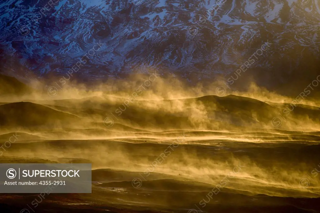 Snow and volcanic ash blowing during a storm, Hofn, Iceland