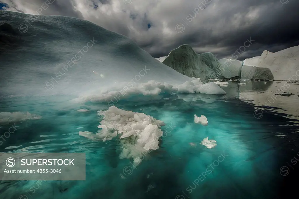 Icebergs floating on water, Ilulissat Icefjord, Disko Bay, Ilulissat, Greenland