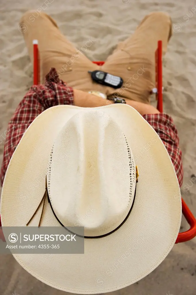 Cowboy with Cell Phone on Miami Beach