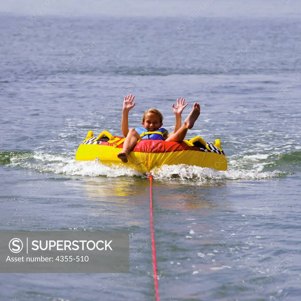 A Vacationer Tubing on the Ocean