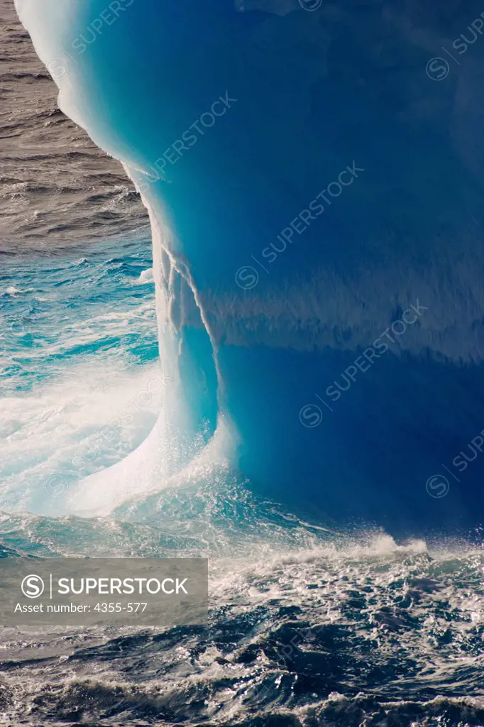 Close Up of the Erosion of the Base of an Irregular Iceberg Near the Antarctica Peninsula