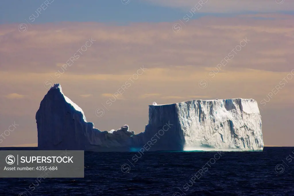 A Large Irregular Iceberg That has Taken a Pounding