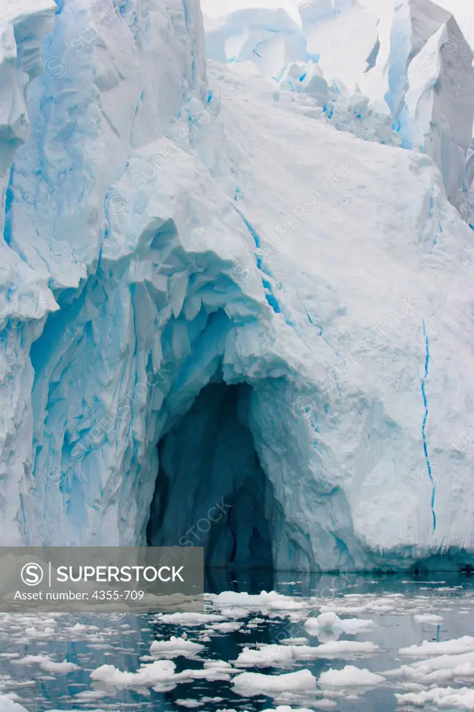A Massive Cave Carved Into an Iceberg