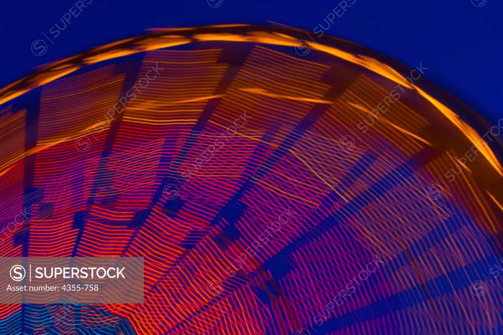 Ferris Wheel Spinning at Night