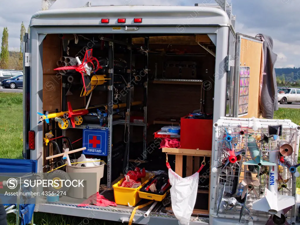 A trailer full of model rockets and rocket launching equipment, out for a rocket launch in east King County.