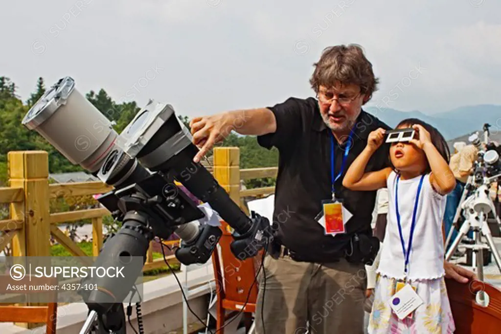 Father and Daughter Observe Total Eclipse Together on July 22, 2009, West of Hangzhou, China