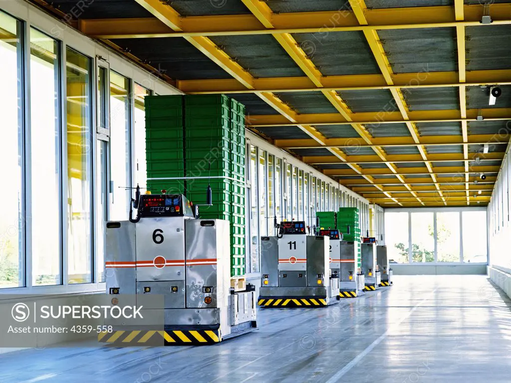 Automatic guided vehicles (AGV) are factory robots carrying materials to the next stage of production