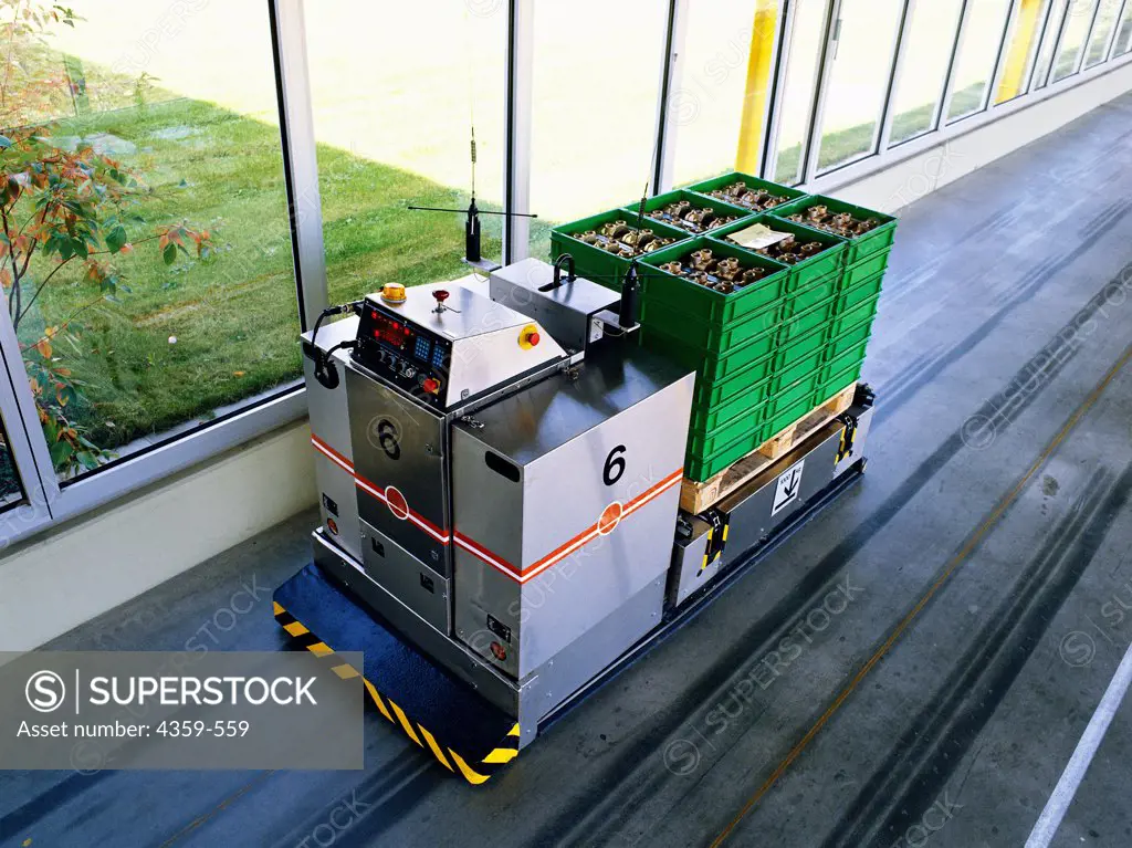 Automatic guided vehicles (AGV) are factory robots carrying materials to the next stage of production