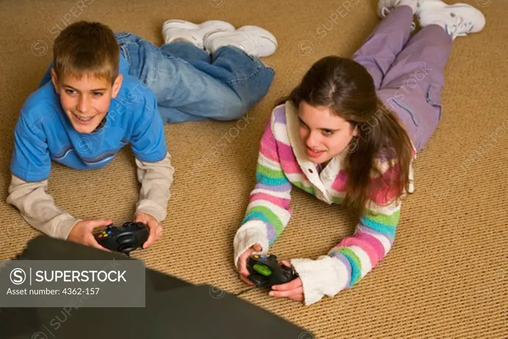 Teenagers Playing Video Game