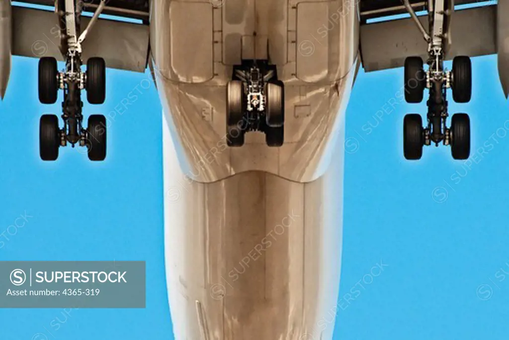 The landing gear and wheels on a large jet aircraft.
