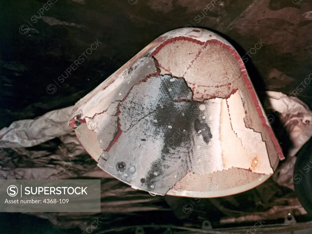 The charred ablative heat shield boilerplate of the Apollo Saturn AS-201 command module recovered by the USS Boxer caused by reentry into the earth's atmosphere.  This was the first launch of Saturn IB vehicle; with suborbital test on February 26, 1966.
