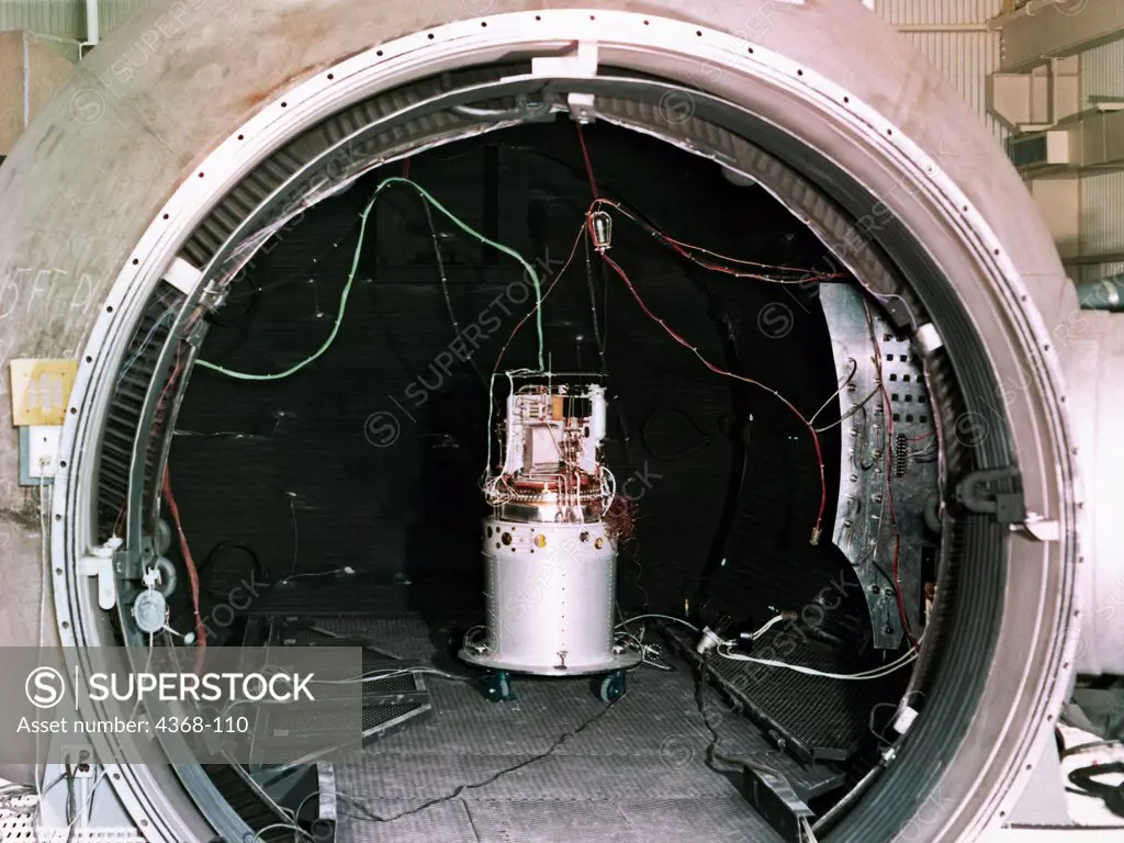 Housed in Bldg. 351, this vacuum chamber has a nine foot diameter nozzle.  Inside is a Pratt-Whitney Apollo Command Service Module (CSM) fuel cell about to undergo testing.