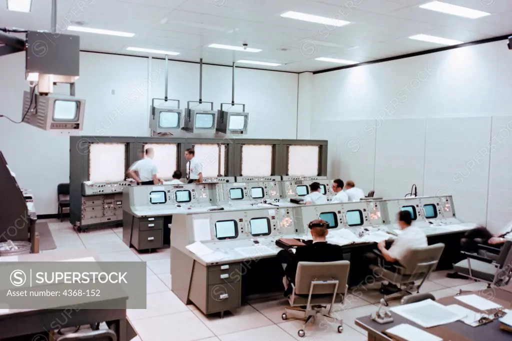 One of the many support rooms that feed the Mission Control Center. This control room monitored and evaluated all aspects of powered flight concerting spacecraft crew safety and orbital insertion, as well as evaluated and recommended modification of trajectories to meet mission objectives.