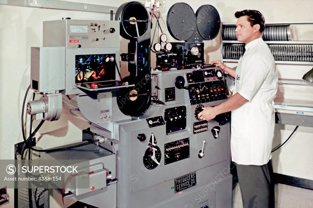 An optical printer, circa 1964. Photo optical printers were used to create effects on film, from dissolves and zooms to aspect ratio changes. This printer also has a color head (left) allowing for color correction.