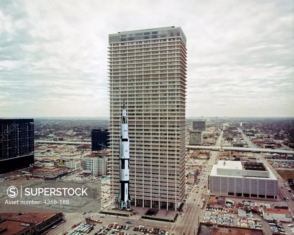 A superimposed Saturn V, 363 feet tall, against Houston's tallest building at the time, the Humble Building. The Exxon Building (formerly the Humble Building) was built in 1963 in Houston, Texas (USA). At that time it was the tallest building west of the Mississippi River at 606 feet (185 m), surpassing the Southland Center in Dallas, Texas (the previous record holder). It only remained the tallest building west of the Mississippi until 1965, when Elm Place was built in Dallas, Texas.