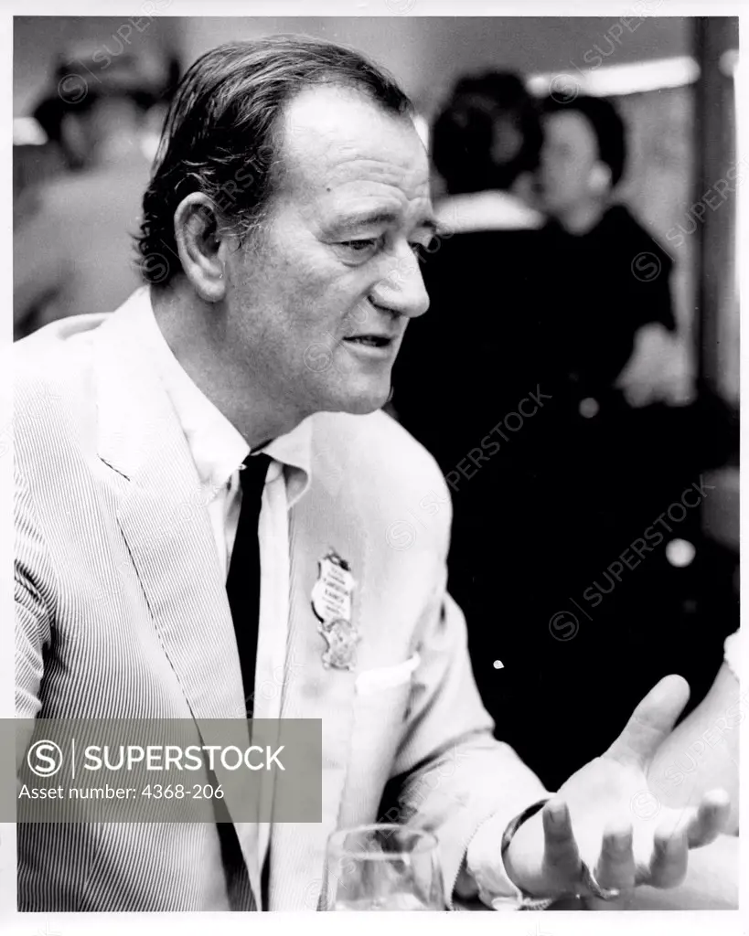 USA, Texas, Houston, John Wayne at  press conference for  1960 movie 'The Alamo' in  Hobby Airport