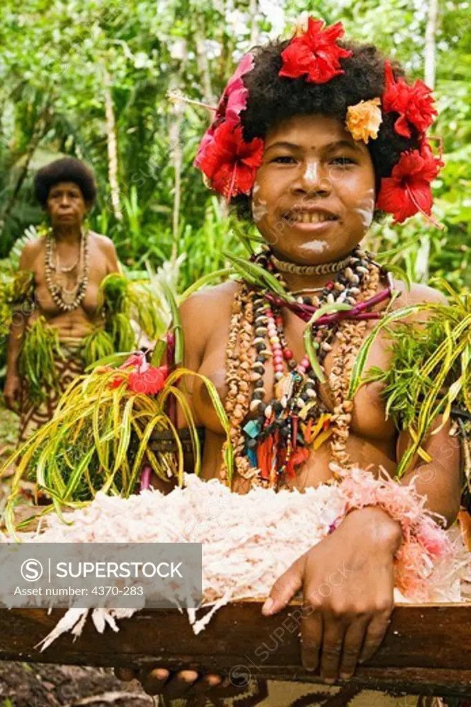 Sago preparation demonstration at cultural event, Tufi, Papua New Guinea.  Sago is a starch derived from the pith of a palm tree. Participating clans were the Fighoya, Kandoro, Tewari, Gaboru, Safu from the villages of Koje, Kofure, Iagirua, Koave, Marabade, Fodoma, Bekoyana, Koyatona.