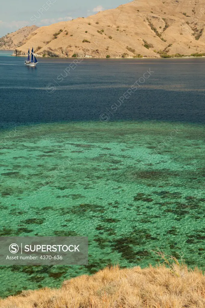 Indonesia, View of bay and ship at Gili Lawa Dalat near Komodo Island