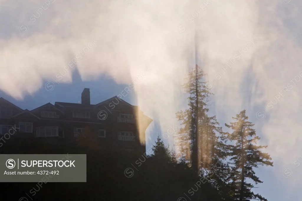 The Salish Lodge, swathed in mist from Snoqualmie Falls, which the Lodge overlooks, east of Seattle.