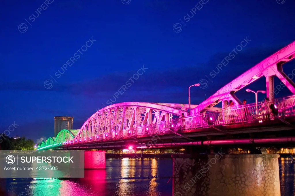 Colorful changing lights on the Trang Tien Bridge, over the Perfume River, Hue, Central Vietnam.
