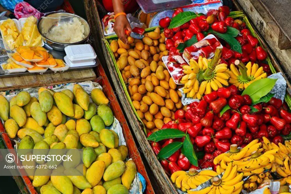 Fruits and vegetables for sale at Ton Kem Market on Khlong Damnoen Saduak, Damnoen Saduak Floating Market area.
