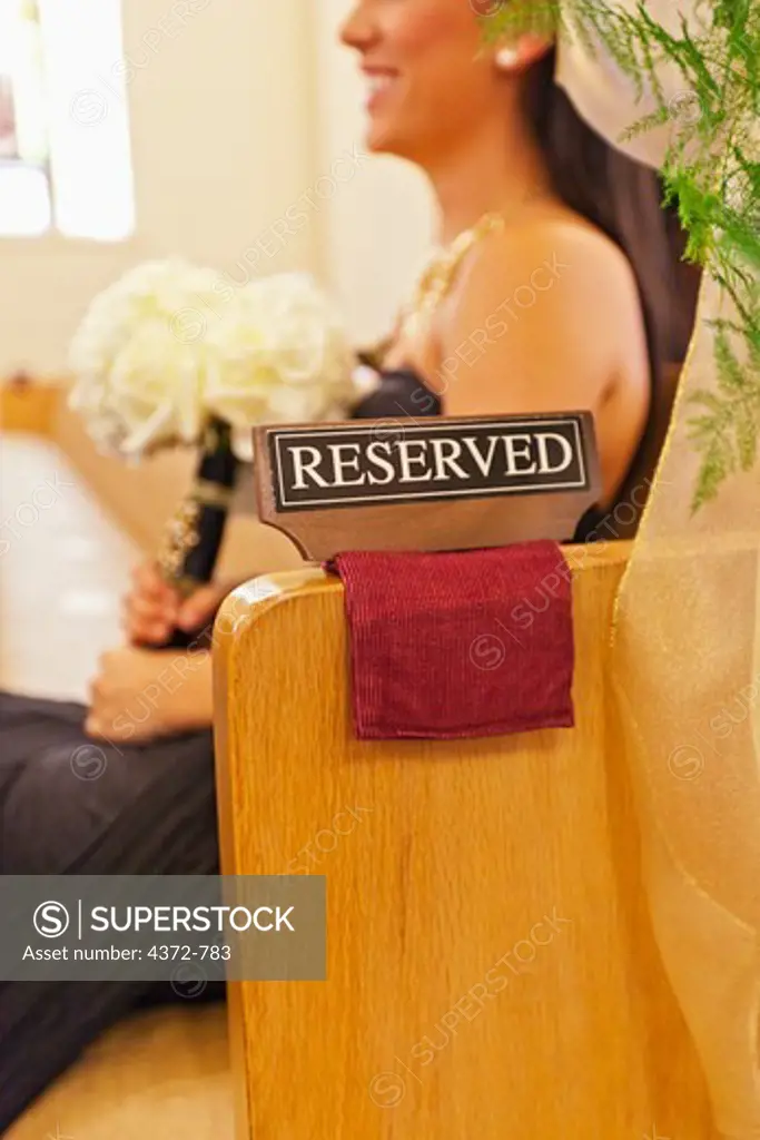 Bridesmaid in reserved seating.