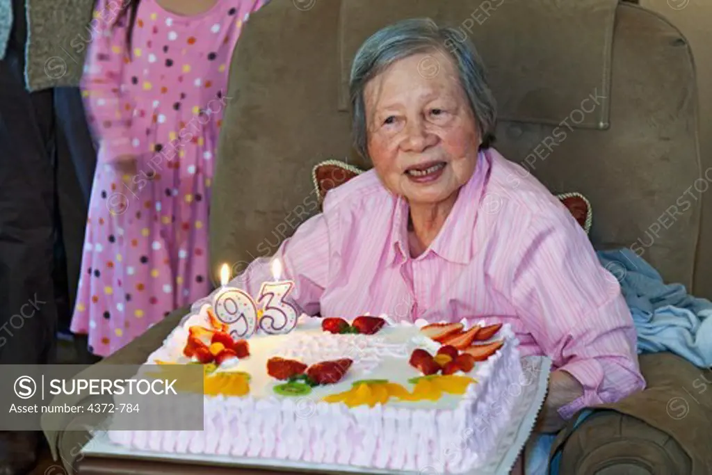 Ninety-three year old woman celebrating her birthday.