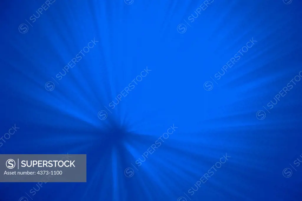 Sunrays Going into Blue Ocean Water