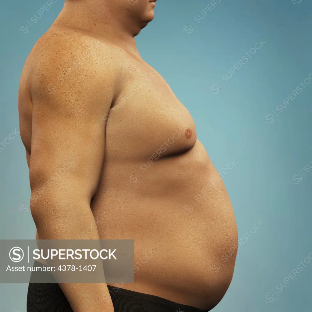 Body fat covering the stomach of an overweight man.