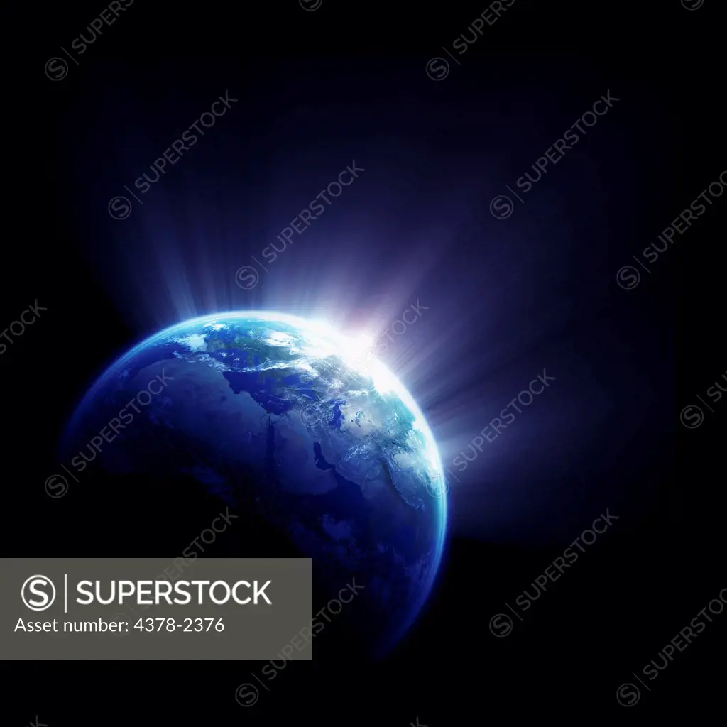 Sunlight emanating from behind planet earth.