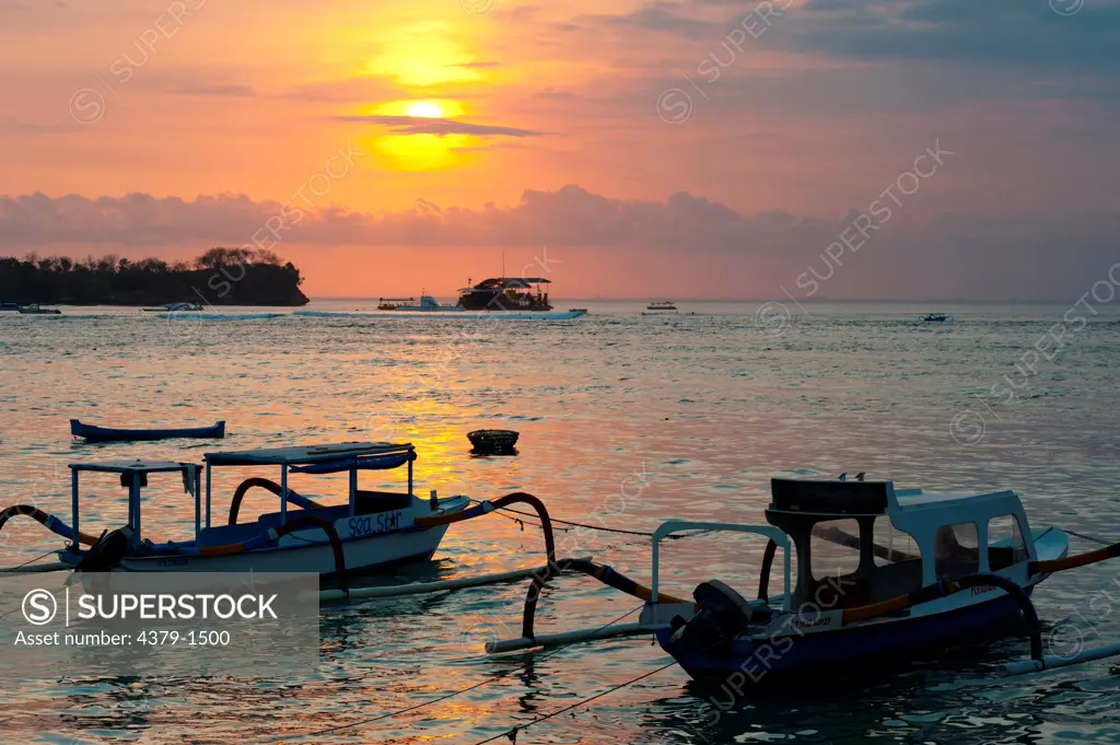 Boats on the shore at sunset, Nusa Lembongan, Bali, Indonesia