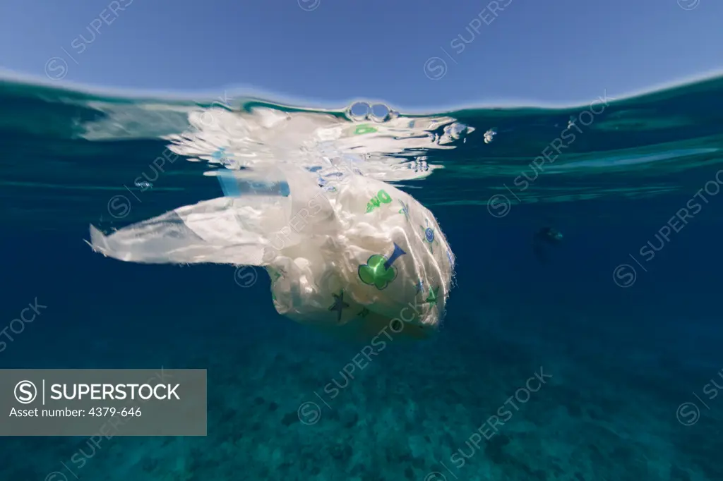 A disposable diaper floating on the surface of the water, Alif Dhaalu Atoll, The Maldives.