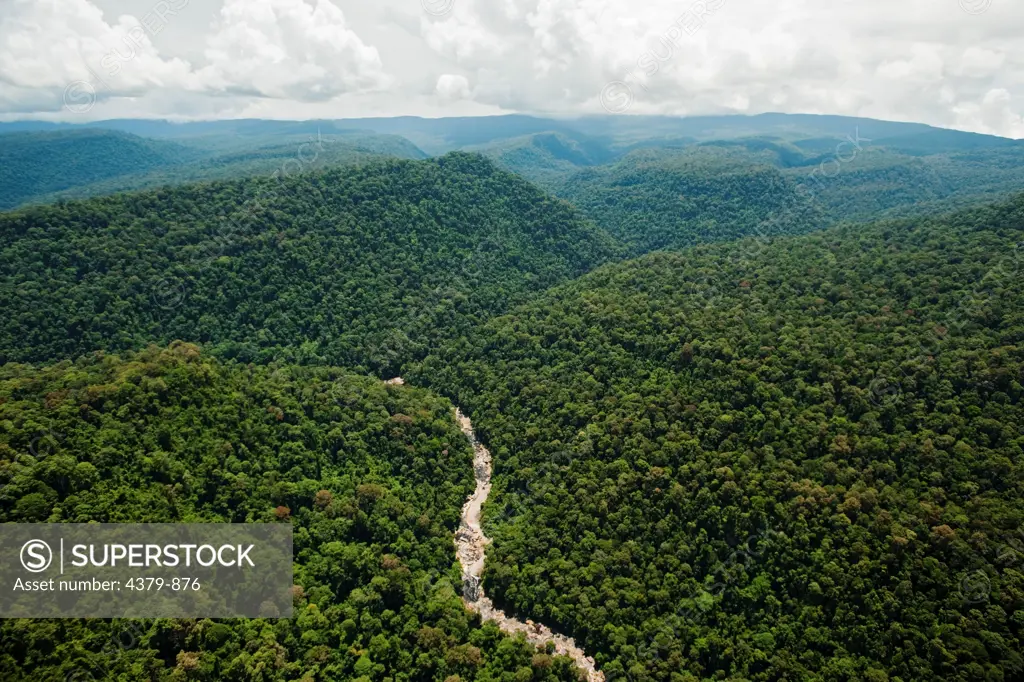 The Maliau River running through dense forest, Maliau Basin, Sabah, Borneo, East Malaysia.