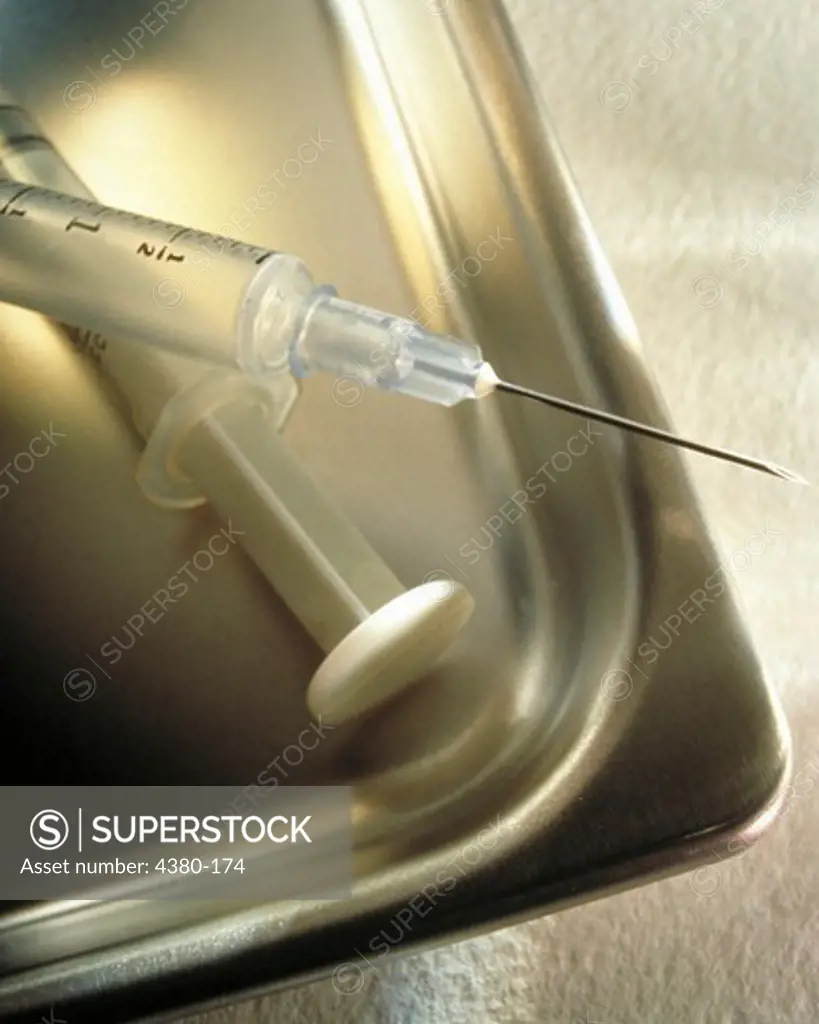 Syringe in Metal Tray