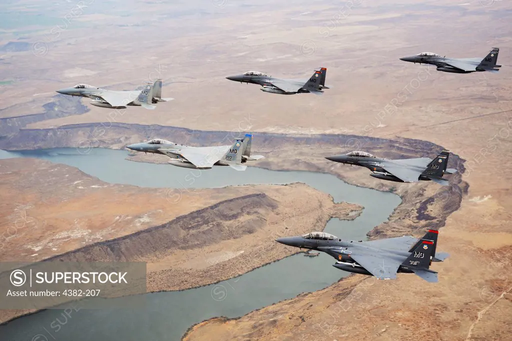 A six-plane formation of F-15C Eagle and F-15E Strike Eagles from the 366th Fighter Wing at Mountain Home Air Force Base, Idaho, fly over the Snake River. (U.S. Air Force photo by Master Sgt. Kevin J. Gruenwald)