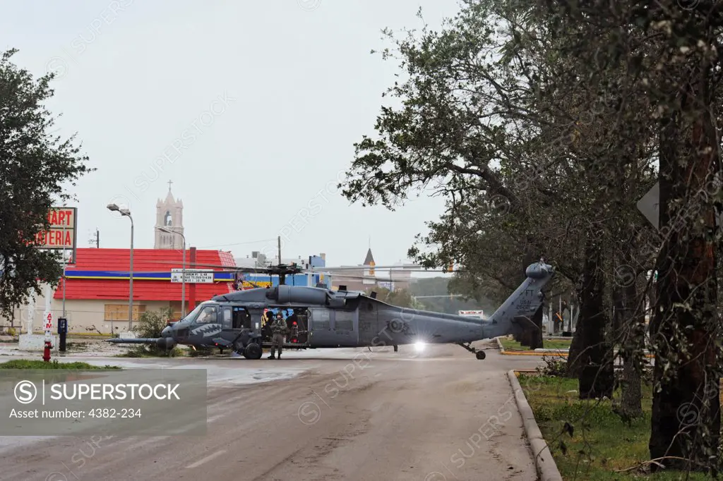 An HH-60 Pave Hawk assigned to the 331st Air Expeditionary Group at Randolph Air Force Base, Texas, sits in the street during operations in Galveston, Texas, after Hurricane Ike came ashore. (U.S. Air Force photo by Staff Sgt. James L. Harper Jr.)