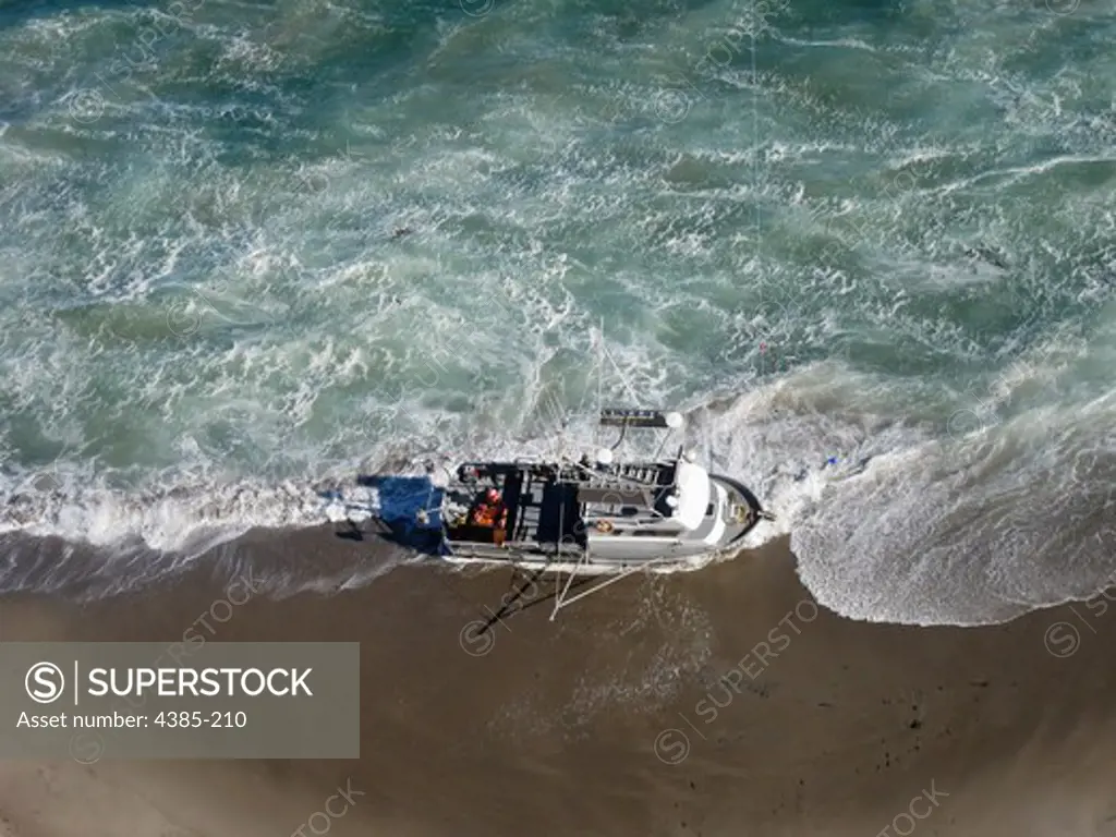 The fishing vessel 'Katie Rae' sits on the beach at Becher's Bay on Santa Rosa Island, as seen by Coast Guard Airstation Los Angeles.