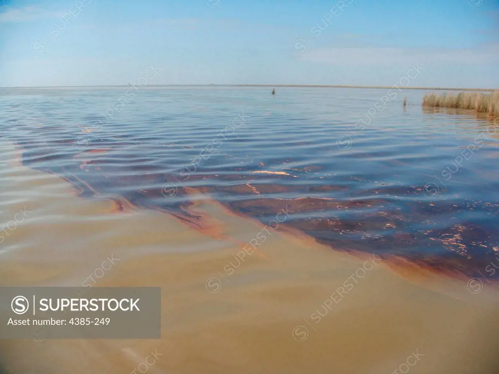 The oil spill, seen here, is being invesigated by the Coast Guard after it was reported in the vicinity of South Pass, La. April 6, 2010.