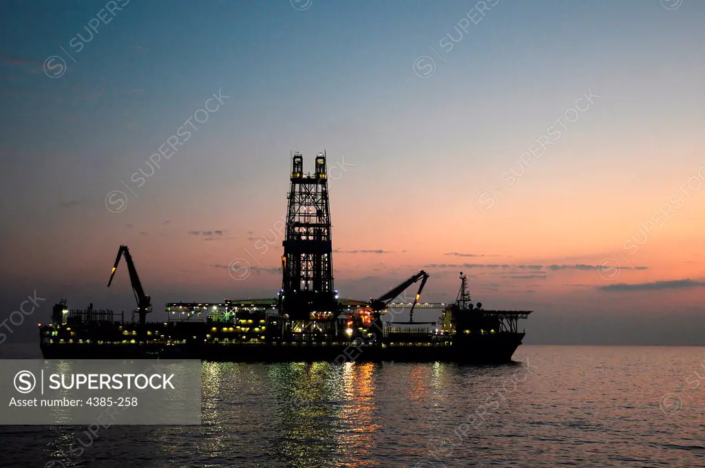 GULF of MEXICO - The drillship Discoverer Enterprise arrives at the Deepwater Horizon site May 7, 2010.  The ship was brought in to drill a relief well to help stop the flow of oil from a wellhead that was damaged when the Deepwater Horizon rig exploded April 20, 2010.