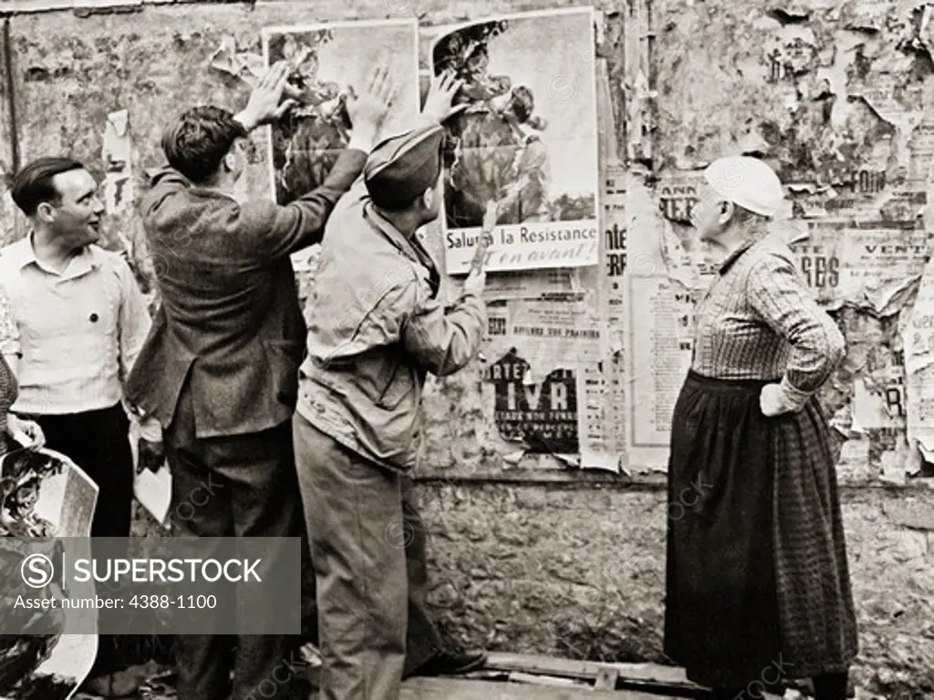 One Soldier and Three Civilians Post Resistance Posters