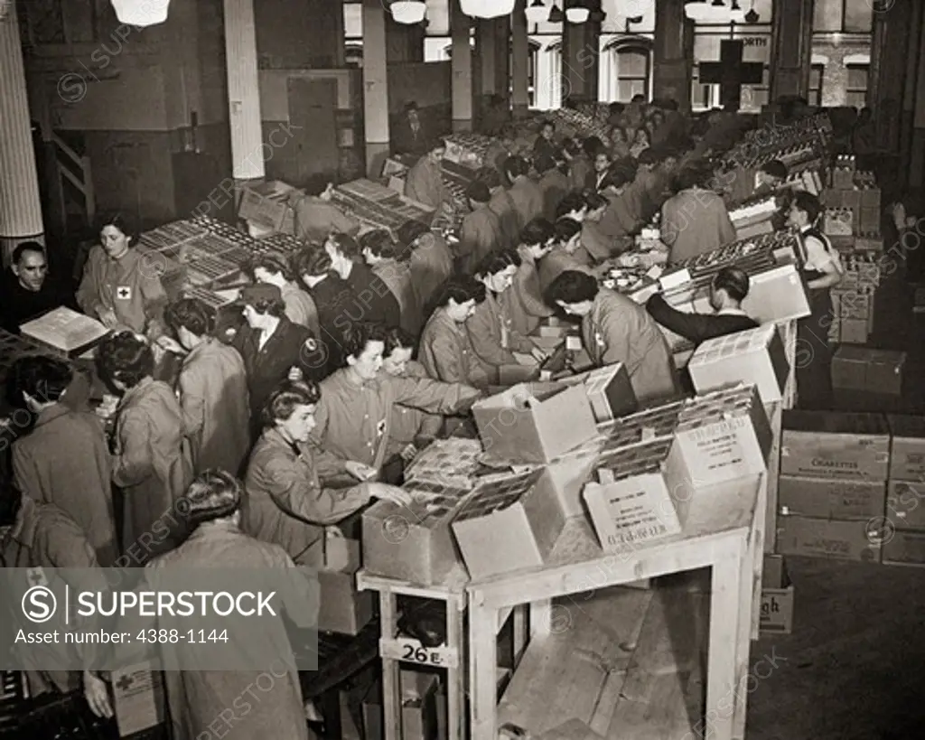 Red Cross Workers Packing Boxes to go to the United States Armed Forces and Prisoners of War